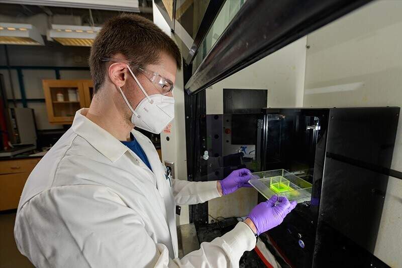 Robert O'Dea, in the photo, is a chemical engineering doctoral student working in the lab of Professor Thomas Epps and co-author on a new paper which looks at methods of repurposing lignin, the hardest-to-recycle part of trees, grasses and other biomass.
