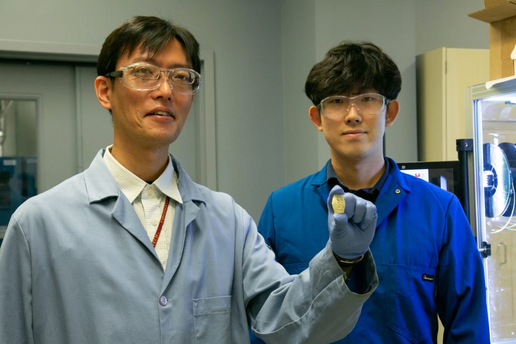 ORNL polymer scientists Tomonori Saito, left, and Sungjin Kim upcycled waste plastic to create a stronger, tougher, solvent-resistant material for new additive manufacturing applications. Credit: Genevieve Martin/ORNL, U.S. Dept. of Energy