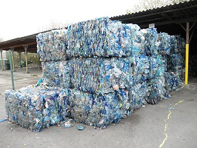 PET can easily be recycled, if it is collected. Bales of PET bottles. 