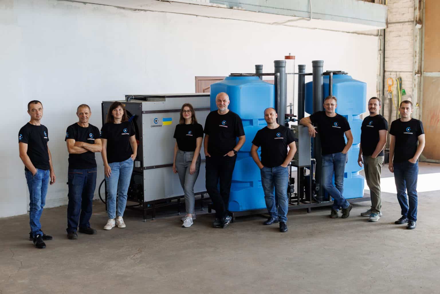 The Carbominer's team in front of its Direct Air Capture (DAC) machine