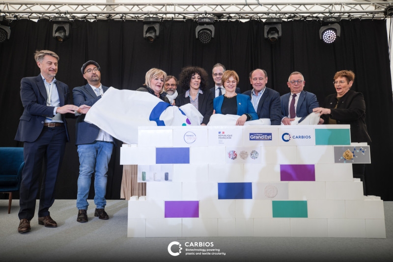 The inaugural moment at the groundbreaking ceremony for CARBIOS' first biorecycling plant. (From left to right): Emmanuel Ladent, CEO of CARBIOS; Hamdi TOUDMA, Mayor of Longlaville; Françoise SOULIMAN, Prefect of Meurthe-et-Moselle; Richard-Daniel BOISSON, Sub-prefect of Val-de-Briey; Chaynesse KHIROUNI, President of the Meurthe-et-Moselle Departmental Council; Mathieu Brandibat, SGPI Critical and Sustainable Materials Adviser; Véronique GUILLOTIN, Senator and Regional Councillor; Philippe Pouletty, Chairman of the Board of Directors of CARBIOS; Serge de CARLI, Chairman of the Longwy Conurbation; Martine ETIENNE, Member of Parliamen