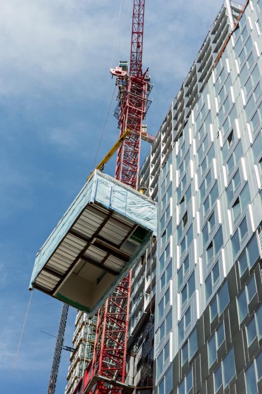 A living space module is hoisted in Brooklyn, New York, for installation into the world’s tallest modular building. Natural-material floor cassettes could one day replace traditional steel-and-concrete surface assemblies in multistory buildings.
