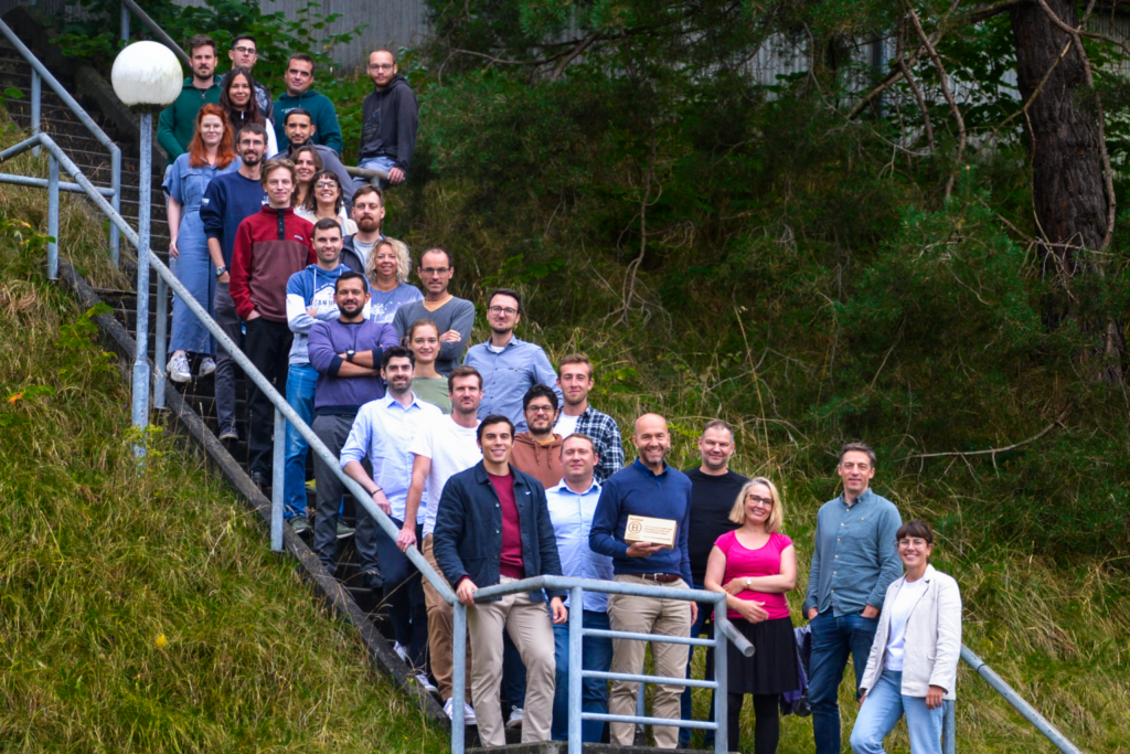 A part of the Bcomp team gathered for the occasion on the steps of the BlueFactory site, where Bcomp has its main offices.