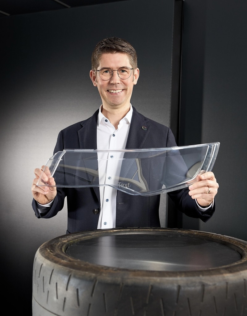 Covestro's recently announced partnership with Neste and Borealis will also have a spot at the Covestro booth. It showcases the closed-loop recycling of old tires into highly transparent polycarbonates that can be used in automotive components - like the one shown by Dr. Guido Naberfeld in the photo.