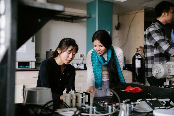 Greeshma Gadikota, associate professor in the School of Civil and Environmental Engineering (right).