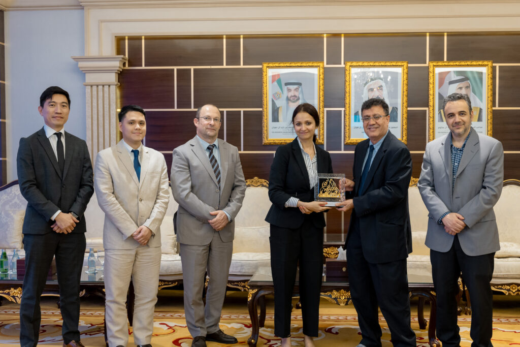 Watid Watanyupaisan, Technical Solution Manager; Bryan De Vega, Marketing & Communications; Christophe Miegeville, EPC Project Officer; Dr. Aman Kulshrestha, Chief Technology Officer, Emirates Biotech; Professor Mohamed H. Al-Marzouqi, Dean; and Professor Sulaiman Al Zuhair, Assistant Dean, College of Engineering, United Arab Emirates University