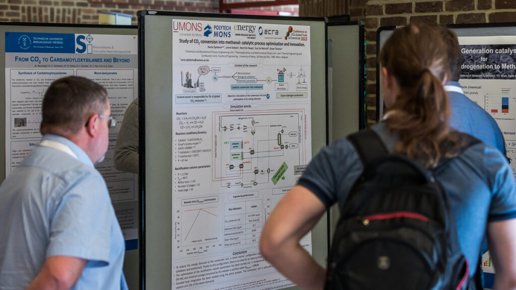 A lively poster session at nova-Institute conferences features numerous attendees engaging animatedly in front of scientific posters, highlighting the outstanding presentation opportunities available at the AI Circular Economy Conference.