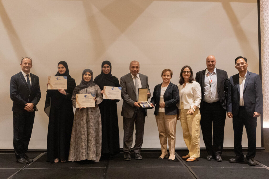 The winning team, Khadeja Al Hadhrami, Reema Al Marzooqi, Suada Al Mansoori, and their supervisors from United Arab Emirates University.