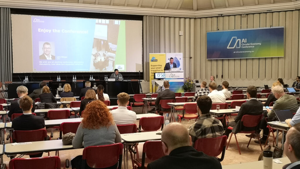 Lars Börger (CEO, nova-Institute) eröffnet die AI Circular Economy Conference 2026 und begrüßt die internationalen Teilnehmer in Köln.