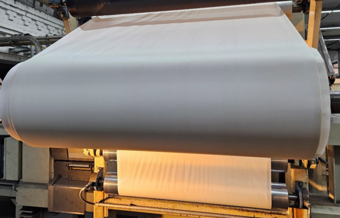 View of the coated paper on the partner company’s rewinding line