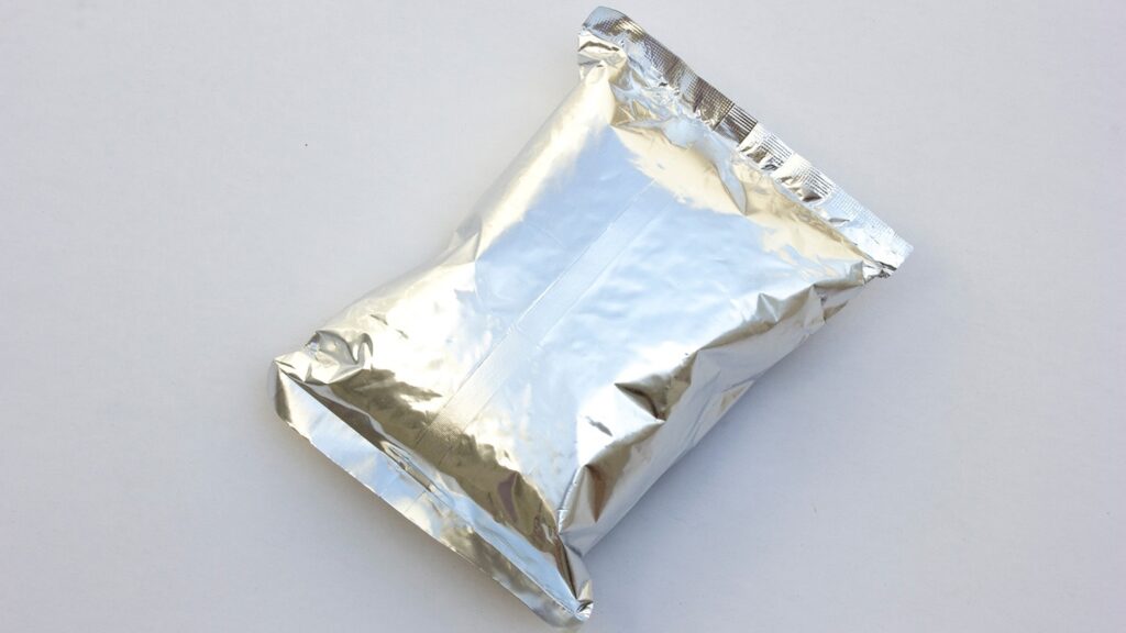 Many conventional packaging products such as potato chip bags, candy wrappers, and squeeze pouches rely on petroleum-based plastics that are highly difficult to recycle and often end up in landfills, where they can persist for decades or even centuries, contributing to long-term plastic waste and environmental pollution.
