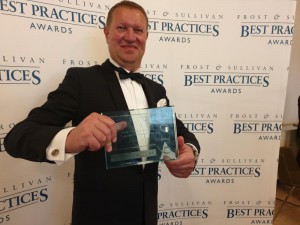 Alex Michine, CEO MetGen, with the Frost & Sullivan Award in London. Now a new award for him