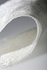 A piece of nonwoven fabric<br />manufactured from recycled <br />cardboard”></td>
</tr>
<tr>
<td style=